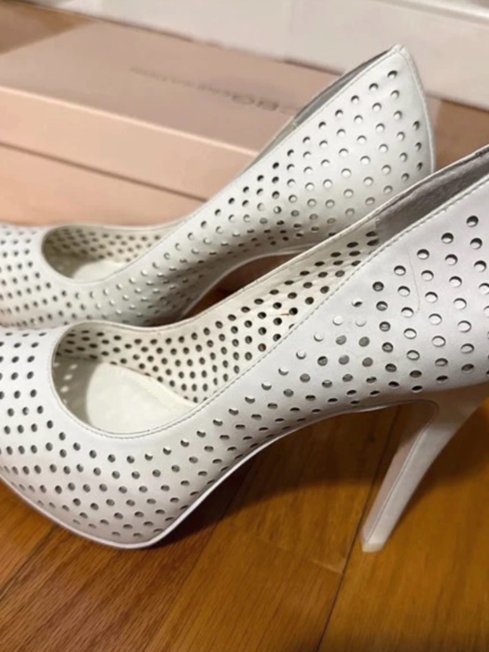 BCBGeneration White Perforated Stiletto Pumps